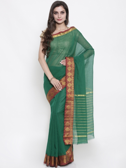 

Pavechas Green & Rust Pure Cotton Solid Venkatgiri Saree