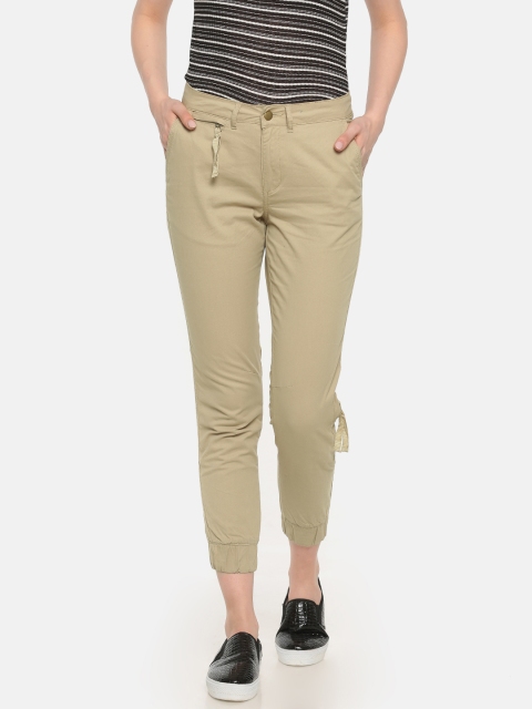 

Sugr Women Beige Slim Fit Solid Regular Trousers