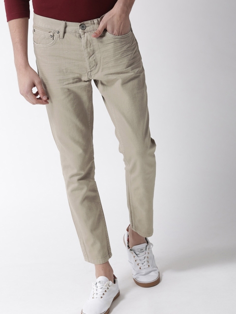 

Mast & Harbour Men Beige Slim Fit Solid Denim Trousers
