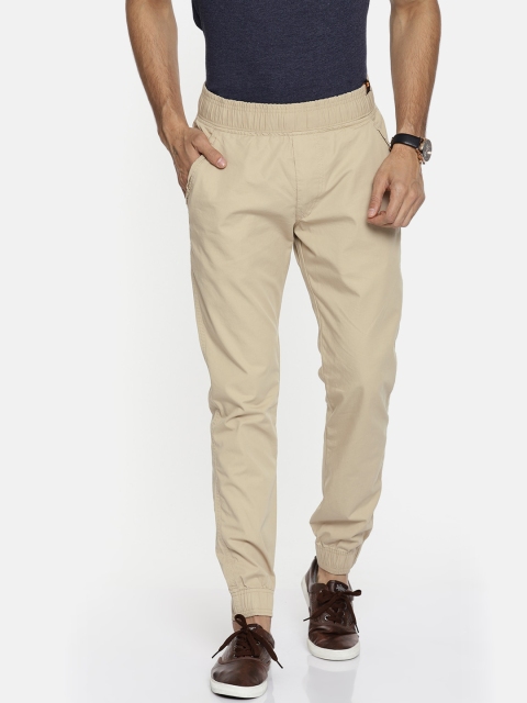 

Sports52 wear Men Beige Carrot Tapered Fit Solid Joggers
