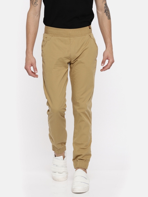 

Sports52 wear Men Beige Carrot Tapered Fit Solid Joggers
