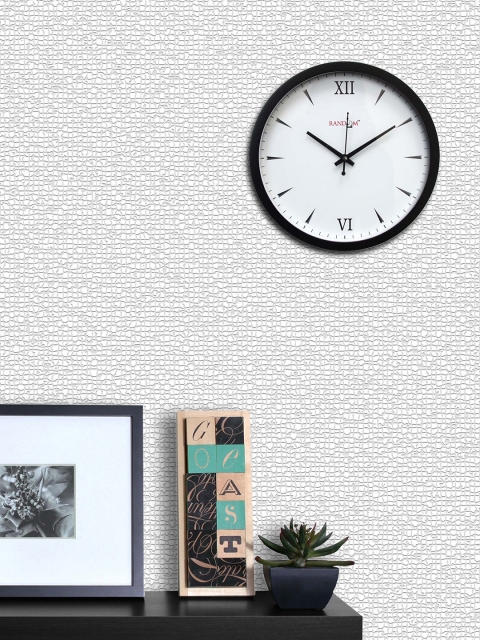 

RANDOM Off-White Round Solid 25.4 cm Analogue Wall Clock