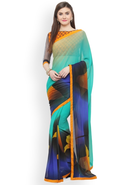 

Shaily Turquoise Blue Printed Pure Georgette Saree
