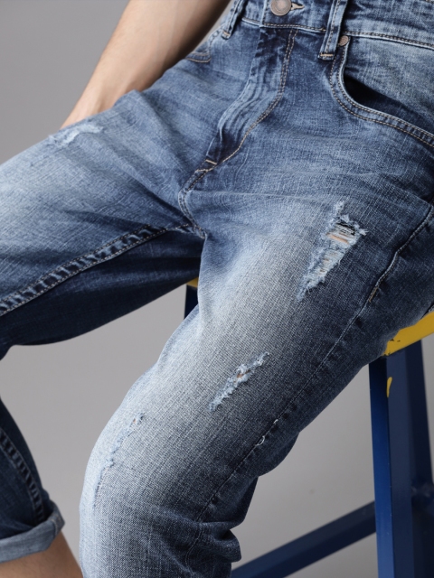 

HERE&NOW Men Blue Tapered Fit Mid-Rise Mildly Distressed Stretchable Cropped Jeans