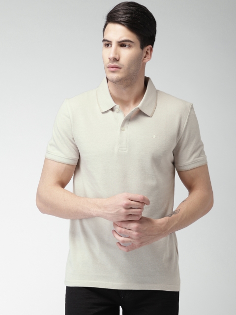 

Celio Men Beige Solid Polo Collar T-shirt