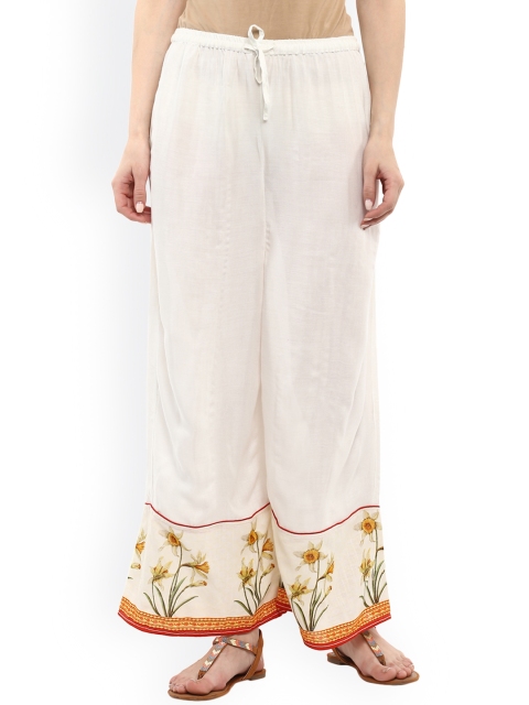

Bhama Couture Women White Printed Flared Palazzos