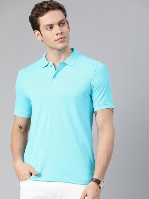 

Van Heusen Men Blue Solid Polo Collar T-shirt