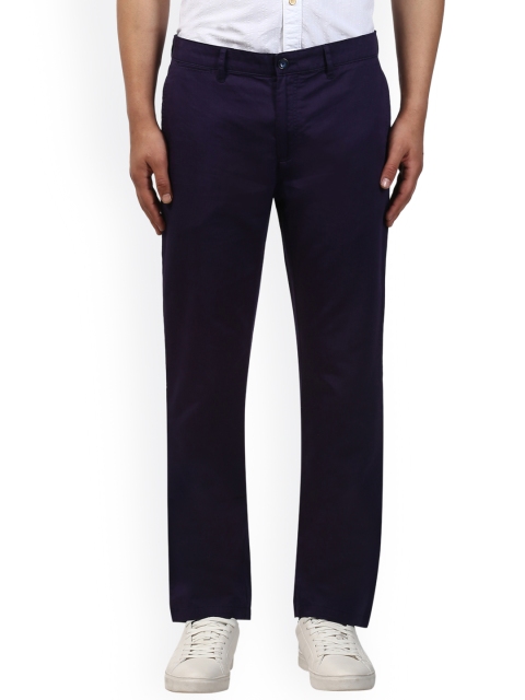 

Raymond Men Blue Regular Fit Solid Regular Trousers