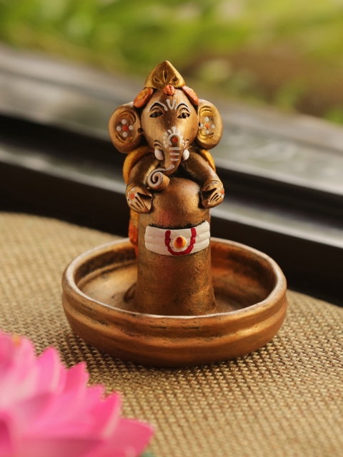 

ExclusiveLane Brown Handmade & Handpainted Ganesha Idol Shaped Showpiece