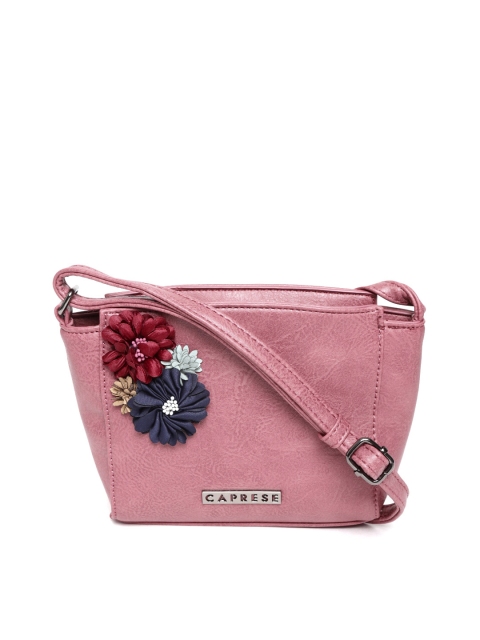 

Caprese Mauve Solid Sling Bag with Floral Appliques