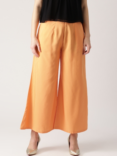 

Libas Women Orange Solid Flared Palazzos