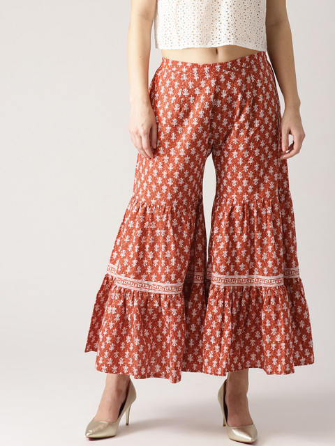 

Libas Women Rust Orange & White Printed Flared Palazzos