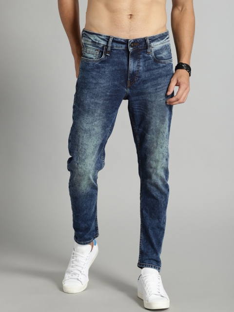 

Roadster Men Blue Carrot Regular Fit Mid-Rise Clean Look Stretchable Jeans