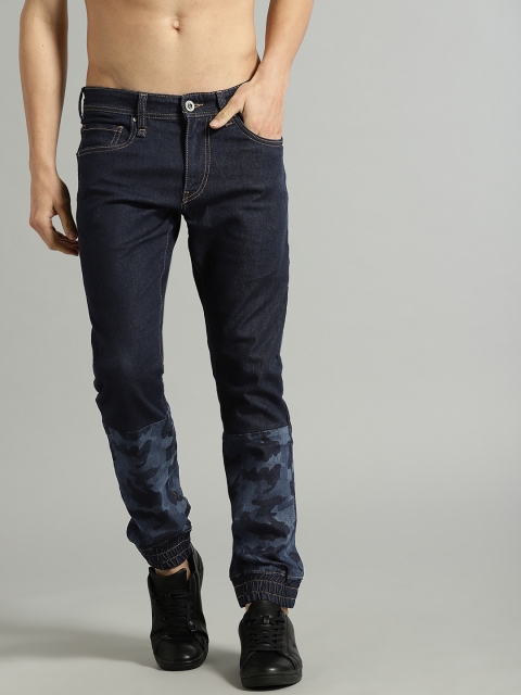 

Roadster Men Navy Blue Slim Jogger Fit Mid-Rise Clean Look Stretchable Joggers