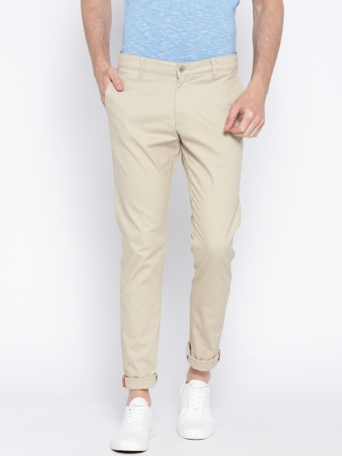 

Blackberrys Men Beige Solid Sharp Fit Regular Trousers