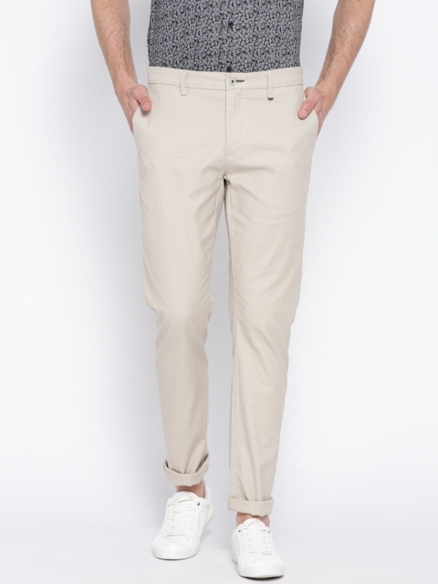 

Blackberrys Men Beige Solid Sharp Fit Regular Trousers