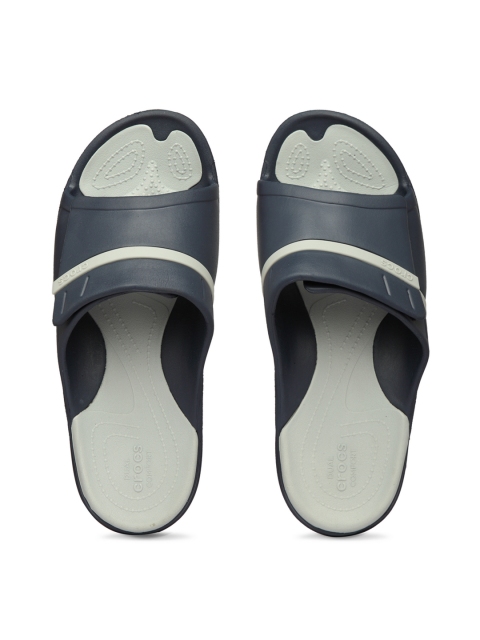 

Crocs Men Blue & Grey Colourblocked Sliders