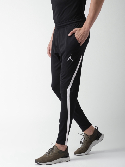 

Nike Men Black ALPHA DRY Printed Track Pants