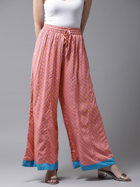 

Moda Rapido Women Peach-Coloured Printed Flared Palazzos