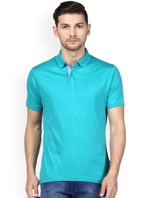 

Parx Men Blue Solid Polo Collar T-shirt