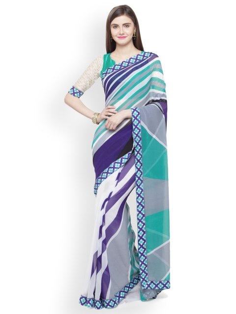 

Shaily Turquoise Blue & White Pure Georgette Printed Saree