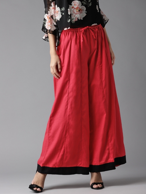 

Moda Rapido Women Red Flared Solid Palazzos