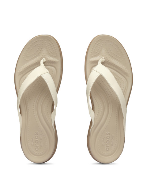 

Crocs Women Beige Solid Flip Flops