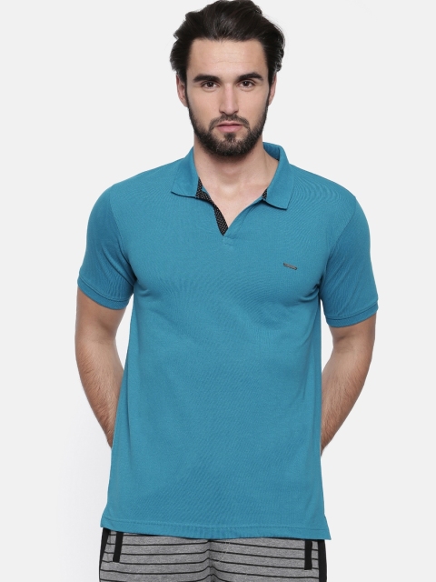 

Proline Men Blue Solid Polo Collar T-shirt