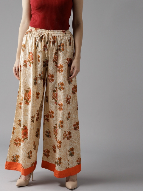 

HERE&NOW Women Beige & Orange Printed Flared Palazzos