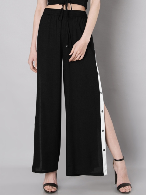 

FabAlley Women Black Flared Solid Parallel Trousers