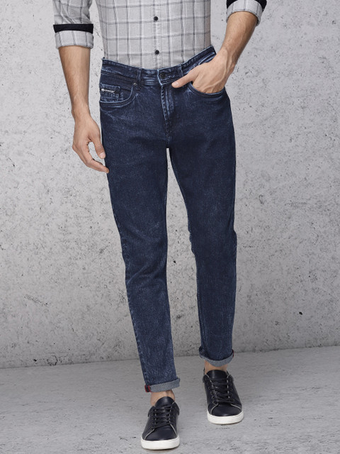 

Ecko Unltd Men Blue Slim Tapered Fit Mid-Rise Clean Look Stretchable Cropped Jeans