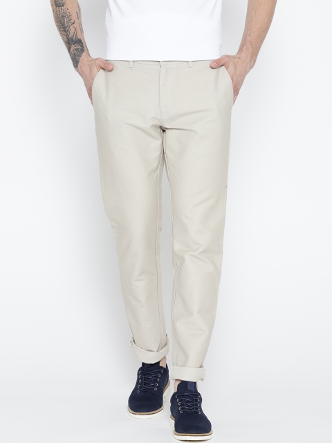 

Blackberrys Men Beige Sharp Fit Solid Trousers