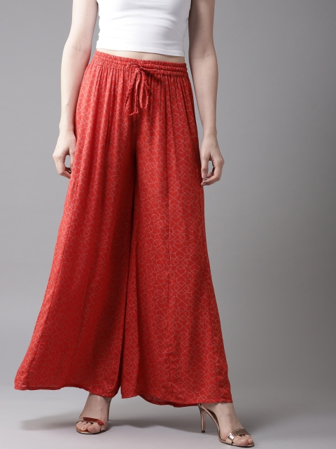 

HERE&NOW Women Orange Flared Printed Palazzos