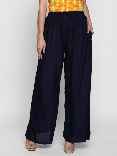 

Ishin Women Navy Blue Solid Flared Palazzos
