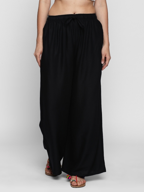 

Ishin Women Black Solid Flared Palazzos