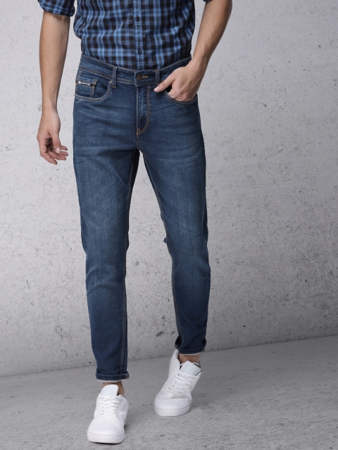 

Ecko Unltd Men Blue Tapered Fit Mid-Rise Clean Look Stretchable Jeans
