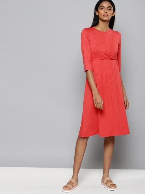 

Chemistry Women Coral Solid Empire Dress