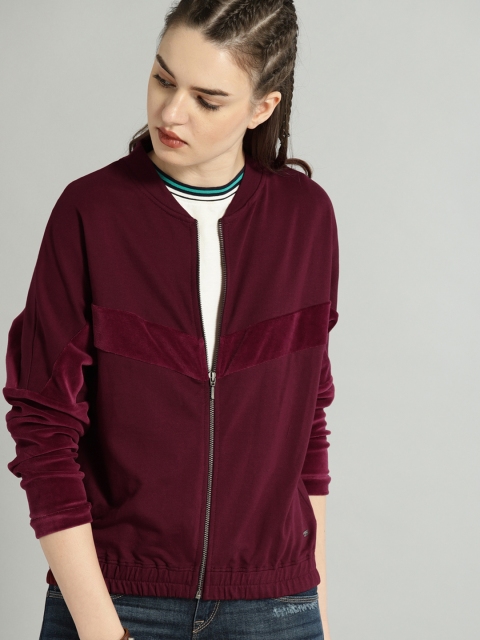 

Roadster Women Burgundy Solid Sweatshirt