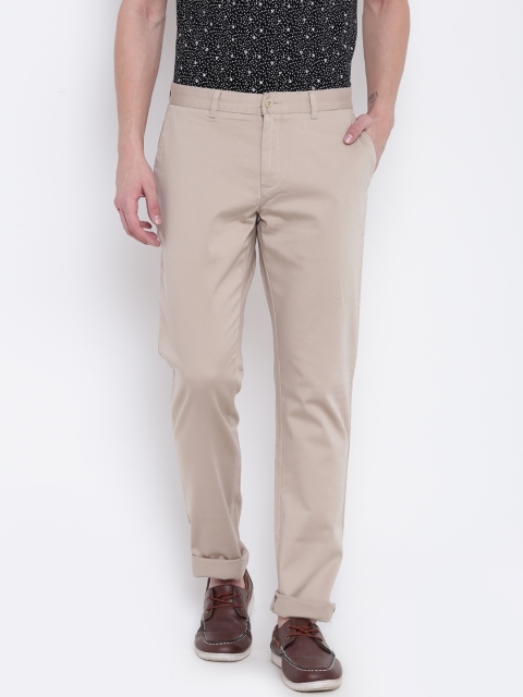 

Blackberrys Men Beige Solid Trousers