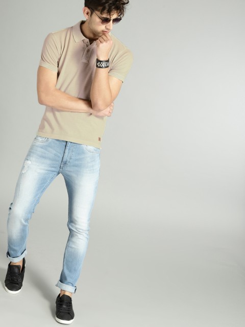 

Roadster Men Beige Solid Polo Collar T-shirt