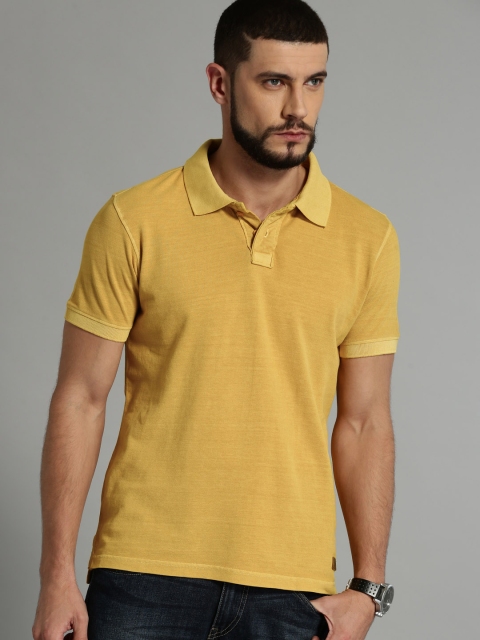 

Roadster Men Mustard Yellow Solid Polo Collar T-shirt
