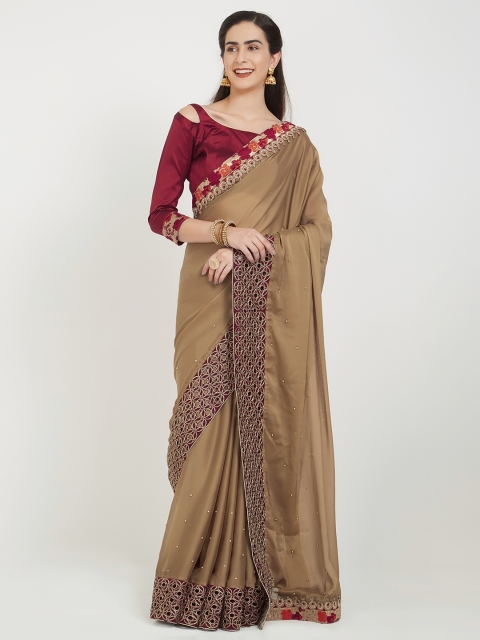 

Indian Women Brown Embellished Pure Georgette Saree