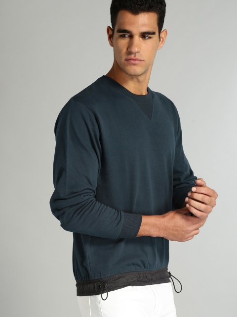 

Roadster Men Navy Blue Solid Sweatshirt