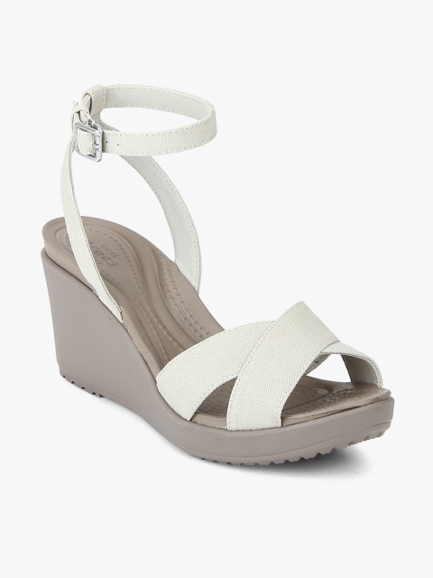

Crocs Women White Solid Pumps