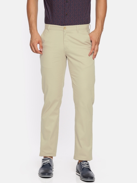 

Raymond Men Beige Regular Fit Solid Regular Trousers