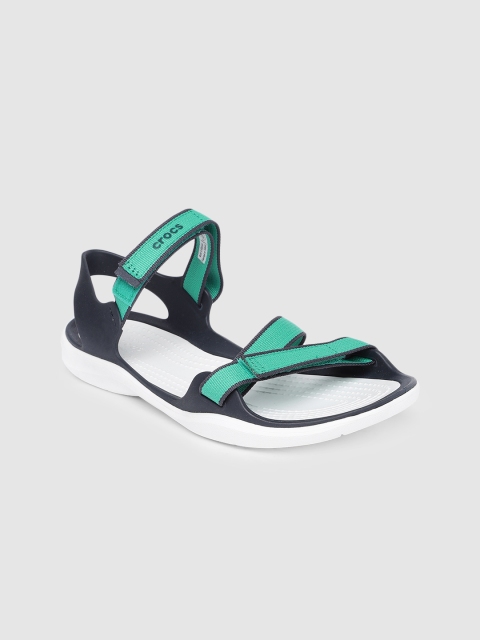 

Crocs Women Green Solid Open-Toe Flats