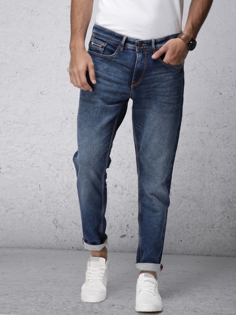 

Ecko Unltd Men Blue Tapered Fit Mid-Rise Clean Look Stretchable Jeans