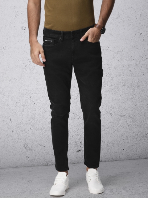 

Ecko Unltd Men Black Tapered Fit Ankle Length Mid-Rise Clean Look Stretchable Jeans