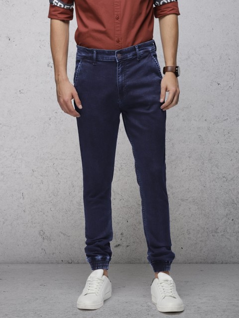 

Ecko Unltd Men Blue Jogger Mid-Rise Clean Look Stretchable Jeans