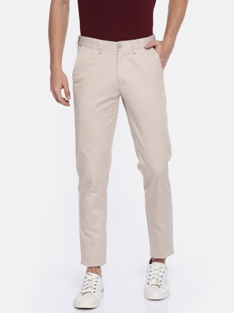 

Peter England Men Beige Super Slim Fit Solid Regular Trousers